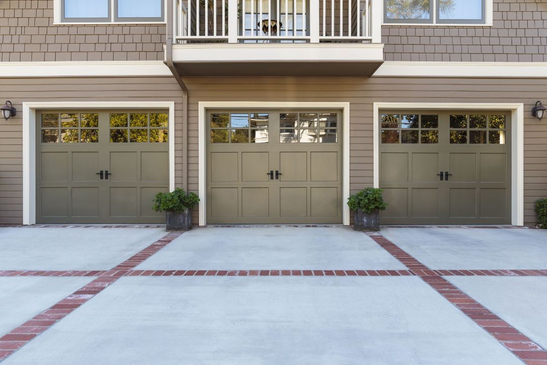 three_car_garage_with_nicely_installed_garage_door_-_garage_door_repairs_in_pensacola_-_pensacola_overhead_door_&_operator.jpg