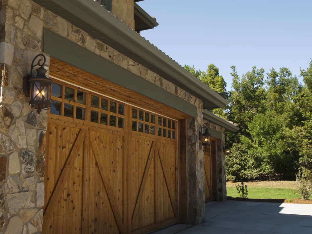 stone_paved_garage_with_wood_garage_door_-_garage_door_repairs_in_pensacola_-_pensacola_overhead_door_&_operator.jpg
