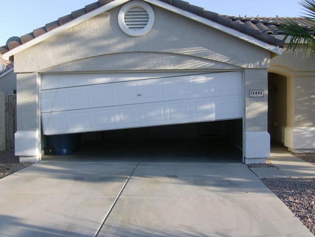 broken garage door track